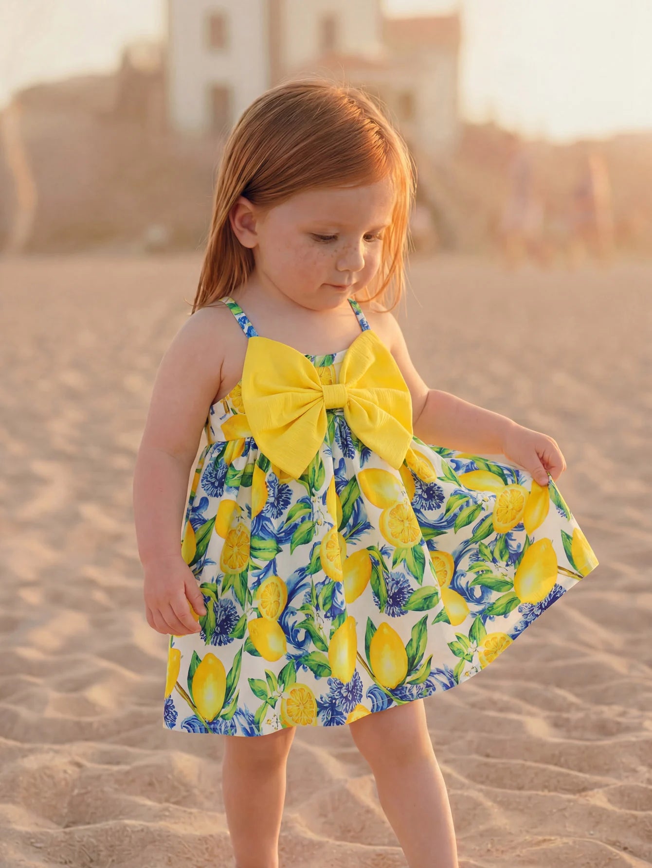 Toddler lemon print sundress with 3D bow, soft & breathable fabric, ideal for daily wear & vacation.